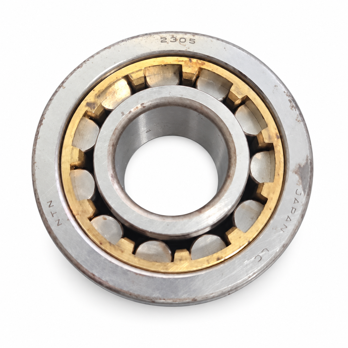 NTN NU2305 cylindrical roller bearing — NOS, actual bearing on white background